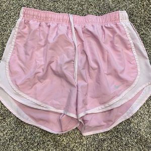 Pink Nike running shorts